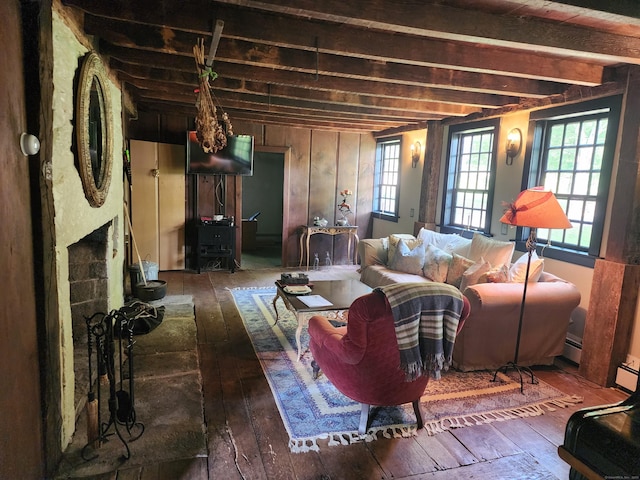 310 S Bigelow Rd, Hampton, CT 06247 - living room featuring hardwood / wood-style flooring, healthy amount of natural light, a baseboard heating unit, a brick fireplace, and beam ceiling