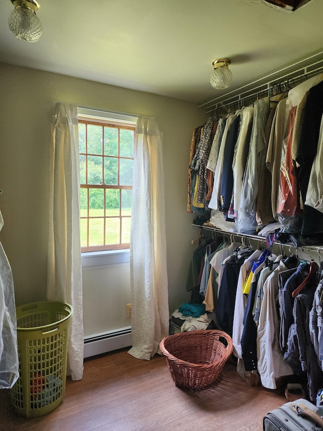 310 S Bigelow Rd, Hampton, CT 06247 - walk in closet with a baseboard radiator and wood finished floors