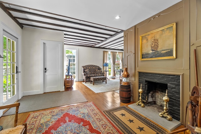 6 Landing Hill Rd, East Haddam, CT 06423 - living area with light wood finished floors, recessed lighting, baseboards, a fireplace, and beamed ceiling
