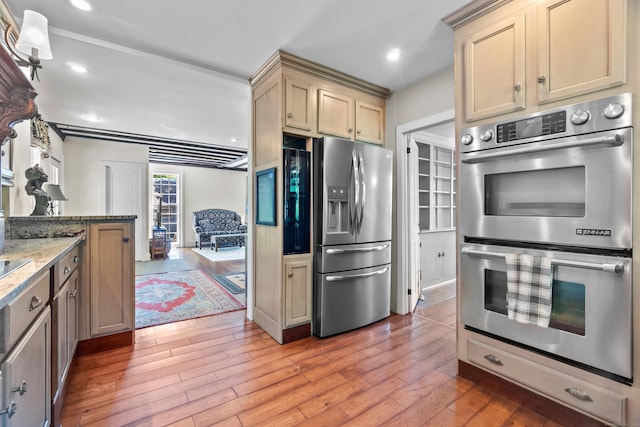 6 Landing Hill Rd, East Haddam, CT 06423 - kitchen featuring appliances with stainless steel finishes, light wood-style floors, light stone countertops, and recessed lighting