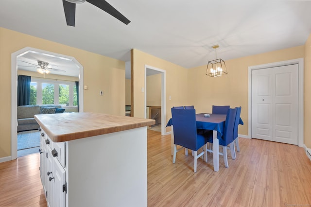 25 Parkwood Ave, Waterbury, CT 06708 - dining room with ceiling fan, light wood-style floors, and a chandelier
