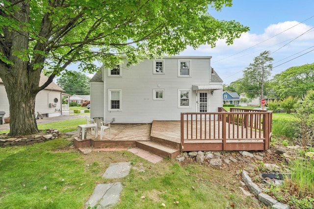 151 Mckee St, Manchester, CT 06040 - rear view of property with a deck and a lawn