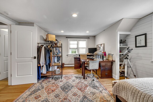 1 Freedman Dr, Norwalk, CT 06854 - bedroom featuring a baseboard radiator, light wood-style floors, a desk, recessed lighting, and baseboards