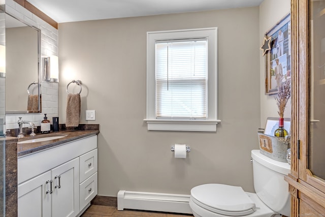 1 Freedman Dr, Norwalk, CT 06854 - bathroom with a baseboard radiator, toilet, and vanity