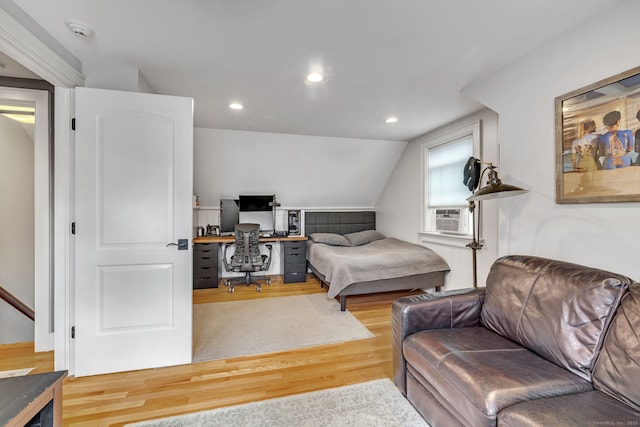 1 Freedman Dr, Norwalk, CT 06854 - bedroom with wood finished floors, an office area, cooling unit, recessed lighting, and lofted ceiling