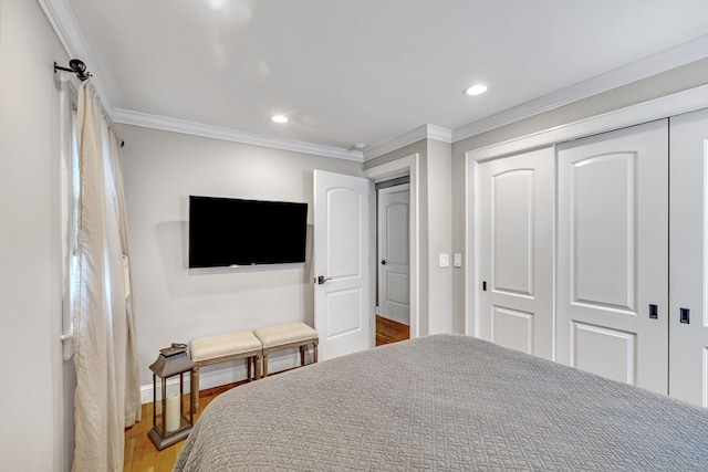 1 Freedman Dr, Norwalk, CT 06854 - bedroom with wood finished floors, baseboards, a closet, ornamental molding, and recessed lighting
