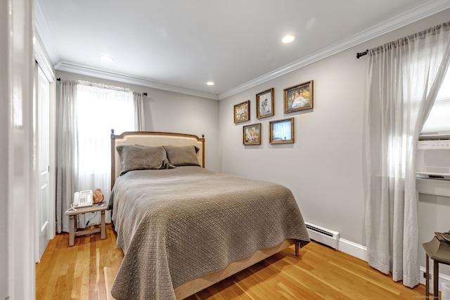 1 Freedman Dr, Norwalk, CT 06854 - bedroom with a baseboard heating unit, recessed lighting, light wood-style floors, and ornamental molding