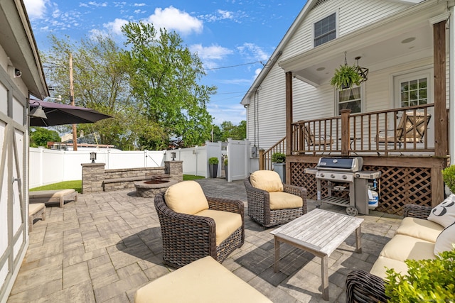 1 Freedman Dr, Norwalk, CT 06854 - fenced backyard with area for grilling, a gate, an outdoor living space, and a patio area