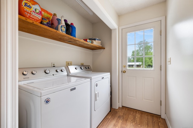 176 Prospect Hill Rd, Colchester, CT 06415 - laundry area featuring washing machine and clothes dryer and light wood-style floors