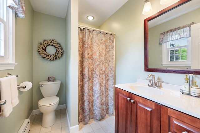 176 Prospect Hill Rd, Colchester, CT 06415 - bathroom featuring a baseboard radiator, toilet, vanity, and healthy amount of natural light