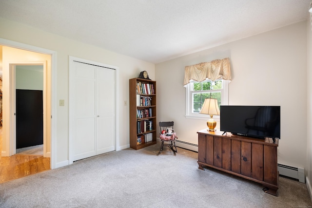 176 Prospect Hill Rd, Colchester, CT 06415 - living area featuring carpet flooring, a baseboard heating unit, and baseboards