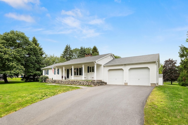 176 Prospect Hill Rd, Colchester, CT 06415 - ranch-style home featuring a garage, asphalt driveway, a front yard, and covered porch