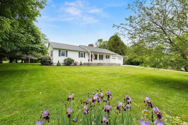 176 Prospect Hill Rd, Colchester, CT 06415 - view of front of home with a chimney, a front lawn, and a garage