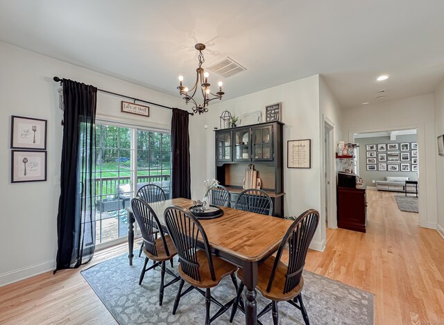 67 Melissa Ln, Prospect, CT 06712 - dining space with a chandelier and light wood-style flooring