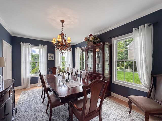 67 Melissa Ln, Prospect, CT 06712 - dining room with a chandelier, healthy amount of natural light, light wood-type flooring, and ornamental molding
