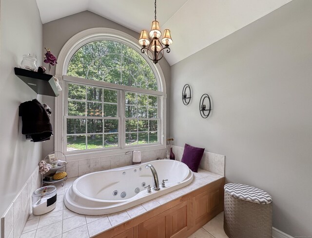 67 Melissa Ln, Prospect, CT 06712 - bathroom with lofted ceiling, plenty of natural light, a tub with jets, a chandelier, and tile patterned flooring