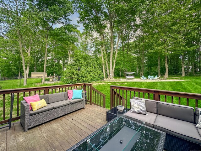67 Melissa Ln, Prospect, CT 06712 - wooden terrace with outdoor lounge area, a lawn, and view of wooded area