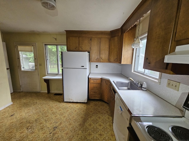 30 Hardwood Rd, Plainville, CT 06062 - kitchen with white appliances, plenty of natural light, light countertops, and exhaust hood