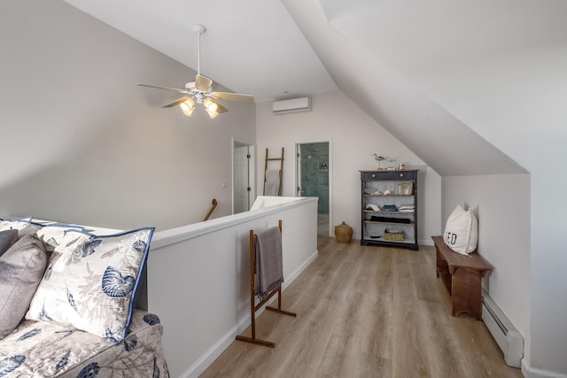 35 Soundview Ave, Old Saybrook, CT 06475 - living room with baseboard heating, a wall mounted air conditioner, vaulted ceiling, light wood-type flooring, and ceiling fan