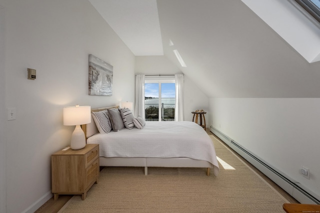 35 Soundview Ave, Old Saybrook, CT 06475 - bedroom with vaulted ceiling, a skylight, baseboard heating, and baseboards