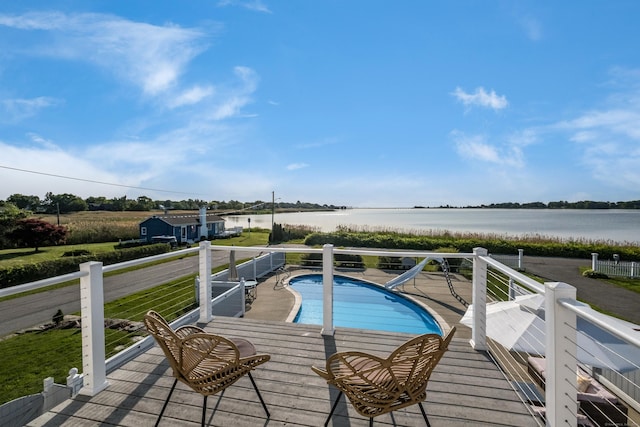 35 Soundview Ave, Old Saybrook, CT 06475 - view of swimming pool with a water slide and a deck with water view