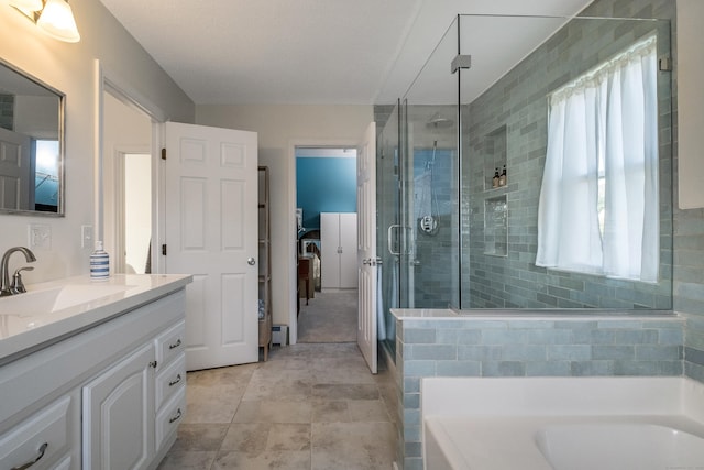 35 Soundview Ave, Old Saybrook, CT 06475 - full bathroom featuring a bath, vanity, a shower stall, and ensuite bathroom