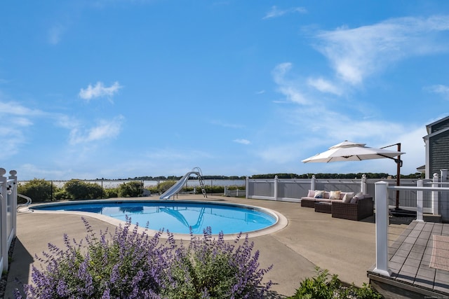 35 Soundview Ave, Old Saybrook, CT 06475 - view of swimming pool featuring a water slide, outdoor lounge area, and a patio