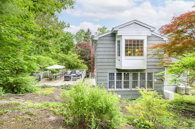 525 Bennetts Farm Rd, Ridgefield, CT 06877 - back of house with a deck, outdoor dining area, and an outdoor living space