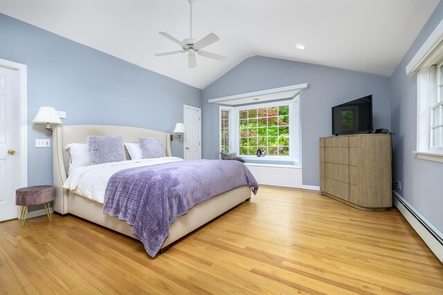 525 Bennetts Farm Rd, Ridgefield, CT 06877 - bedroom featuring baseboard heating, light wood-style flooring, vaulted ceiling, a ceiling fan, and baseboards