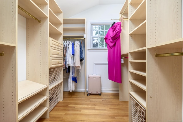 525 Bennetts Farm Rd, Ridgefield, CT 06877 - walk in closet with light wood-type flooring and vaulted ceiling