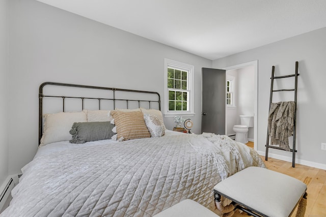 53 Pratt Rd, Plainfield, CT 06374 - bedroom featuring a baseboard radiator, wood finished floors, and baseboards