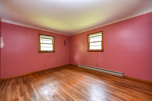 10 Meeting House Rd, Barkhamsted, CT 06063 - unfurnished room featuring baseboard heating, healthy amount of natural light, and wood finished floors