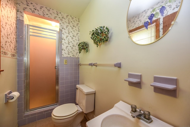 10 Meeting House Rd, Barkhamsted, CT 06063 - full bathroom featuring toilet, a stall shower, wallpapered walls, tile walls, and tile patterned flooring