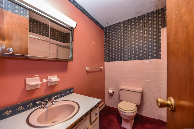 10 Meeting House Rd, Barkhamsted, CT 06063 - bathroom featuring vanity, toilet, and tile walls