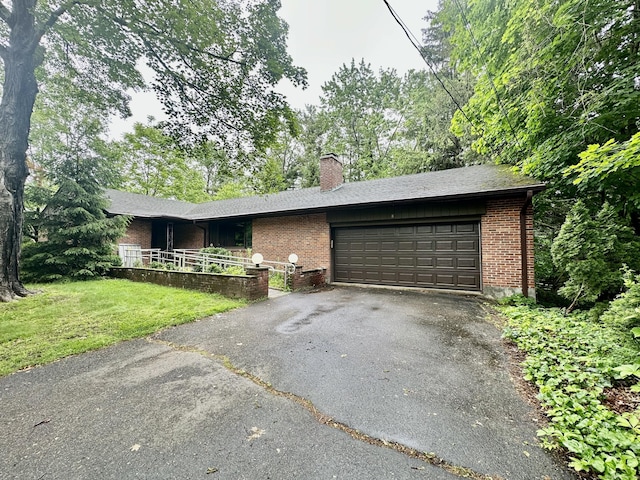 8 Lincoln Ave, West Hartford, CT 06117 - ranch-style home with brick siding, driveway, a chimney, an attached garage, and a front lawn