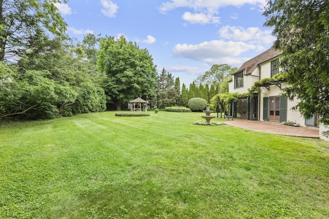 20 Cook Rd, Stamford, CT 06902 - view of green lawn with a gazebo and a patio