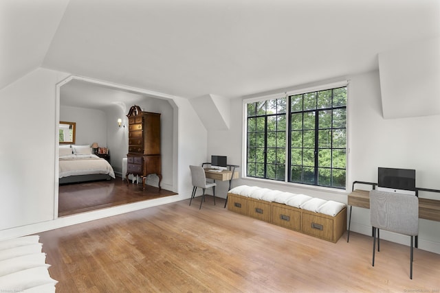 20 Cook Rd, Stamford, CT 06902 - bedroom featuring an office area, wood finished floors, and vaulted ceiling