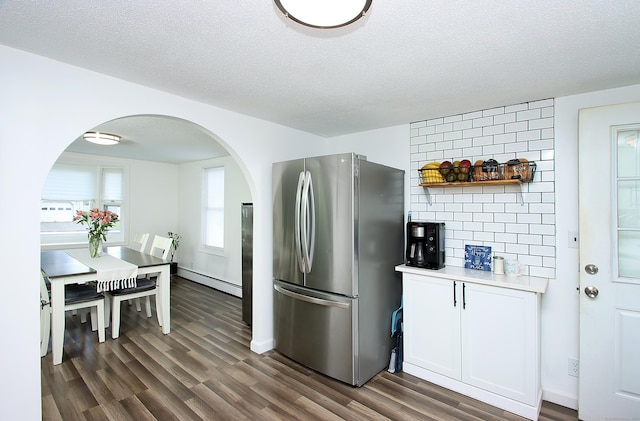 537 Hobart St, Southington, CT 06489 - kitchen featuring freestanding refrigerator, baseboard heating, arched walkways, open shelves, and dark wood finished floors