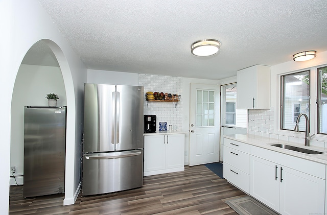 537 Hobart St, Southington, CT 06489 - kitchen with freestanding refrigerator, a sink, dark wood-type flooring, backsplash, and a textured ceiling