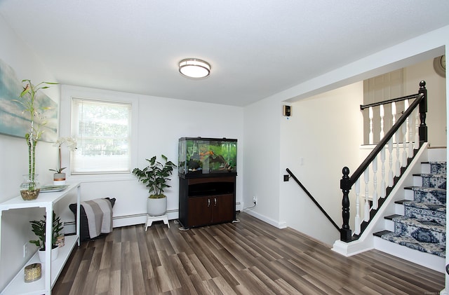 537 Hobart St, Southington, CT 06489 - living area featuring wood finished floors, stairway, and baseboards