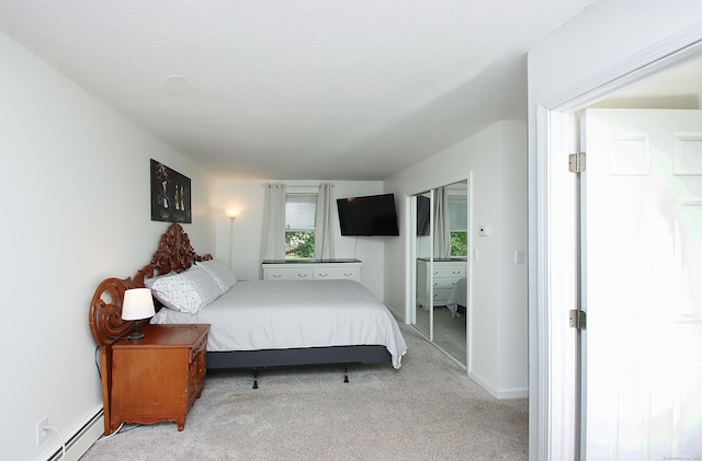 537 Hobart St, Southington, CT 06489 - bedroom with baseboard heating and light carpet
