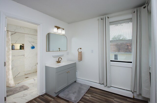 537 Hobart St, Southington, CT 06489 - full bathroom featuring vanity, a marble finish shower, and wood finished floors