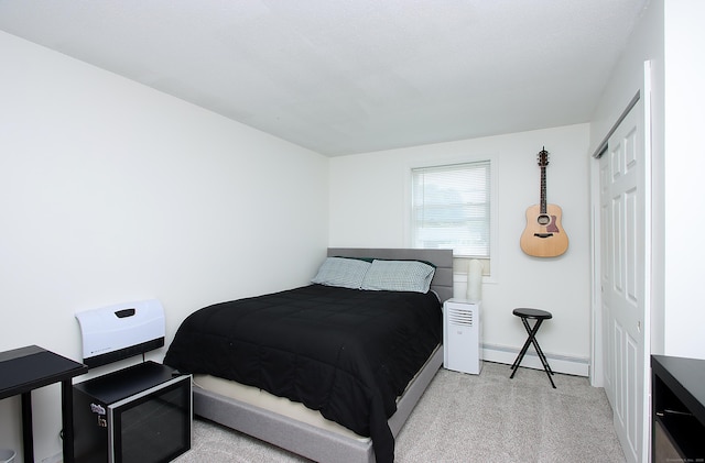 537 Hobart St, Southington, CT 06489 - bedroom featuring a baseboard radiator, carpet flooring, baseboards, and a closet