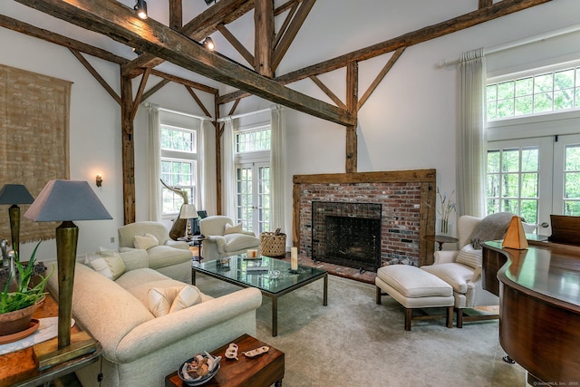 88 Hemlock Rd, Roxbury, CT 06783 - living area with beam ceiling, high vaulted ceiling, and a fireplace