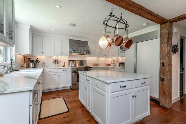 88 Hemlock Rd, Roxbury, CT 06783 - kitchen featuring premium appliances, wall chimney exhaust hood, a sink, white cabinets, and recessed lighting