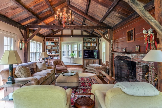 88 Hemlock Rd, Roxbury, CT 06783 - living area with wooden ceiling, a brick fireplace, wood finished floors, wood walls, and a chandelier