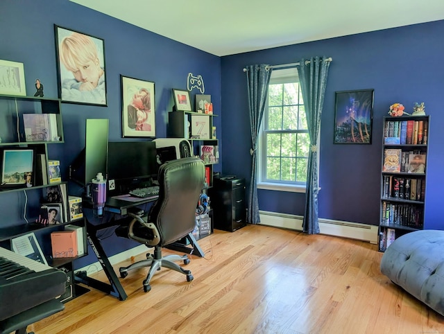 35 Snake Meadow Rd, Killingly, CT 06239 - office featuring wood finished floors, baseboards, and a baseboard heating unit