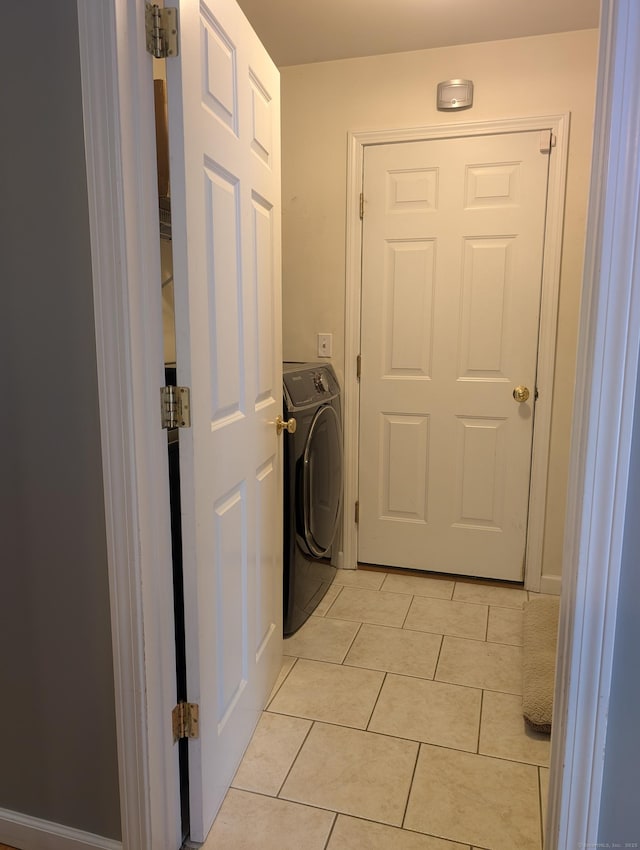 35 Snake Meadow Rd, Killingly, CT 06239 - laundry area featuring washer / dryer and light tile patterned flooring