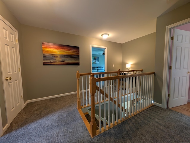 35 Snake Meadow Rd, Killingly, CT 06239 - hall with an upstairs landing, carpet, and baseboards