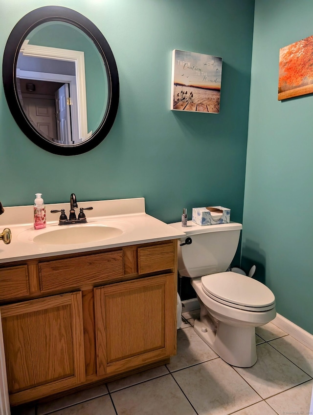 35 Snake Meadow Rd, Killingly, CT 06239 - half bath with toilet, vanity, tile patterned flooring, and baseboards